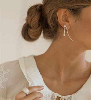 Conjunto de brincos individuais em prata 925 com zircónias da marca portuguesa Arcane Jewellery.