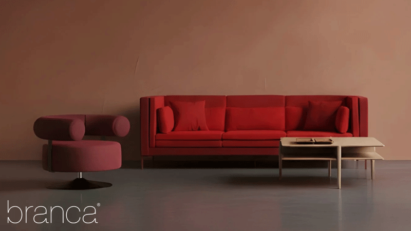 Mobiliário da marca portuguesa Branca Lisboa, como o Layer Sofa, desenhado por Marco Sousa Santos, destaca-se pelo seu design em formato de concha com um elegante tom vermelho vibrante.