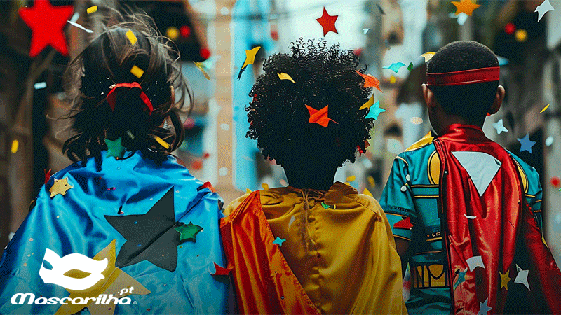 Três crianças vistas de costas, com capas e disfarces coloridos de super-heróis da marca portuguesa MASCARILHA®, rodeadas por confetes e elementos festivos.